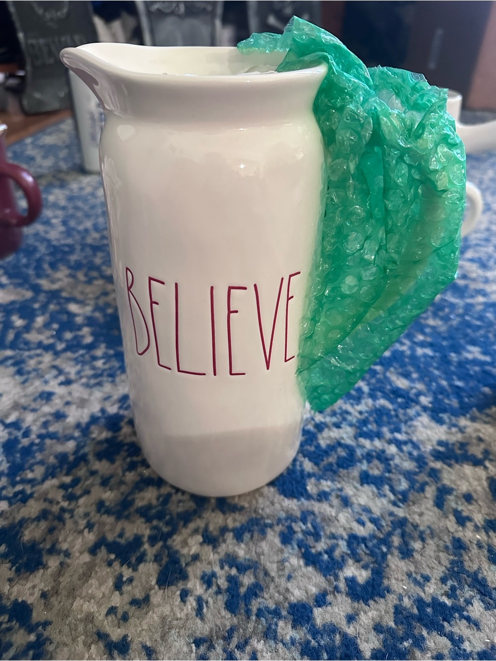 Rae Dunn White Ceramic Pitcher with Red "BELIEVE" Lettering